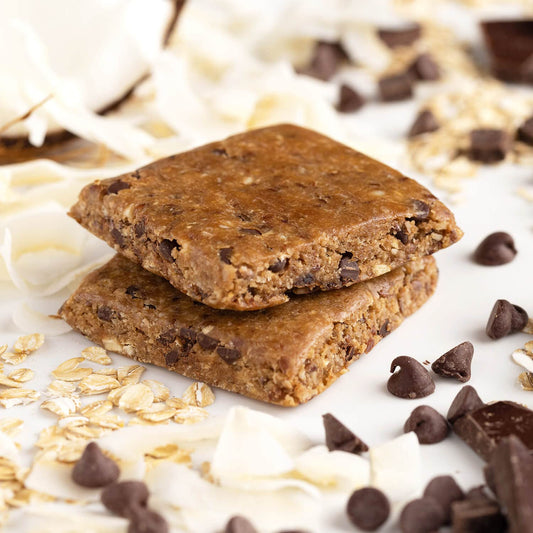 PROBAR MEAL Bar Chocolate Coconut bite displays crunchy texture and flavor.