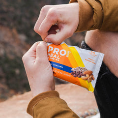 PROBAR MEAL Bar Original Trail Mix ingredients close-up featuring oats and seeds for wholesome nutrition.