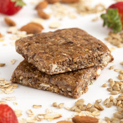 Close-up of oats, nuts and seeds to show plant-based protein and fiber.
