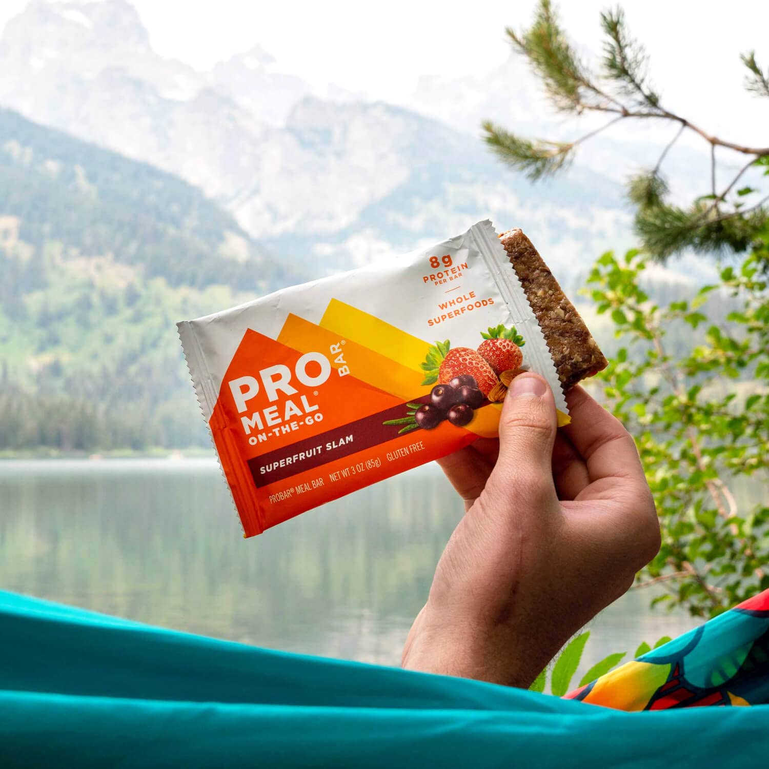 Texture shot of chewy bite and fruit pieces for on-the-go satisfaction.