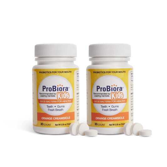 ProBiora Kids oral-care tablet dissolves at bedtime to support fresher breath and whiter teeth.
