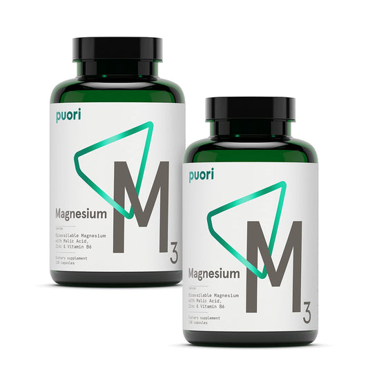 Puori M3 bottle with capsules on table for daily energy and muscle support.
