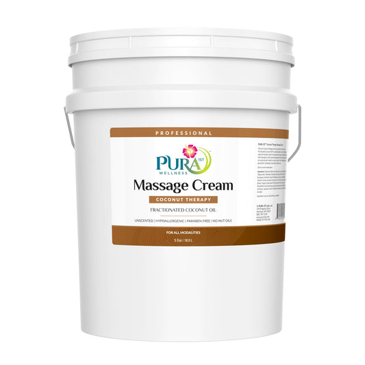 PURA 1st Coconut Therapy massage cream bottle showing easy-grip design for professional use