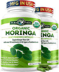 PURA VIDA MORINGA capsules bottle showing convenient daily supplement for energy and nutrients.