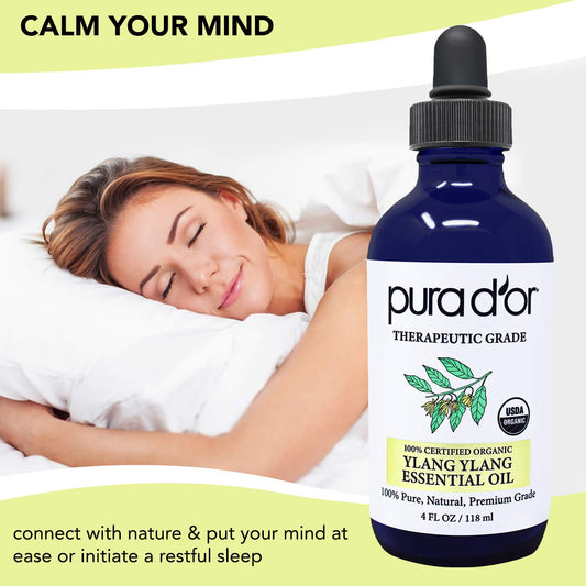 PURA D'OR Ylang Ylang oil label close-up showing purity.
