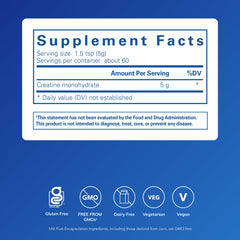 Measuring scoop dispensing creatine powder for consistent dosing.