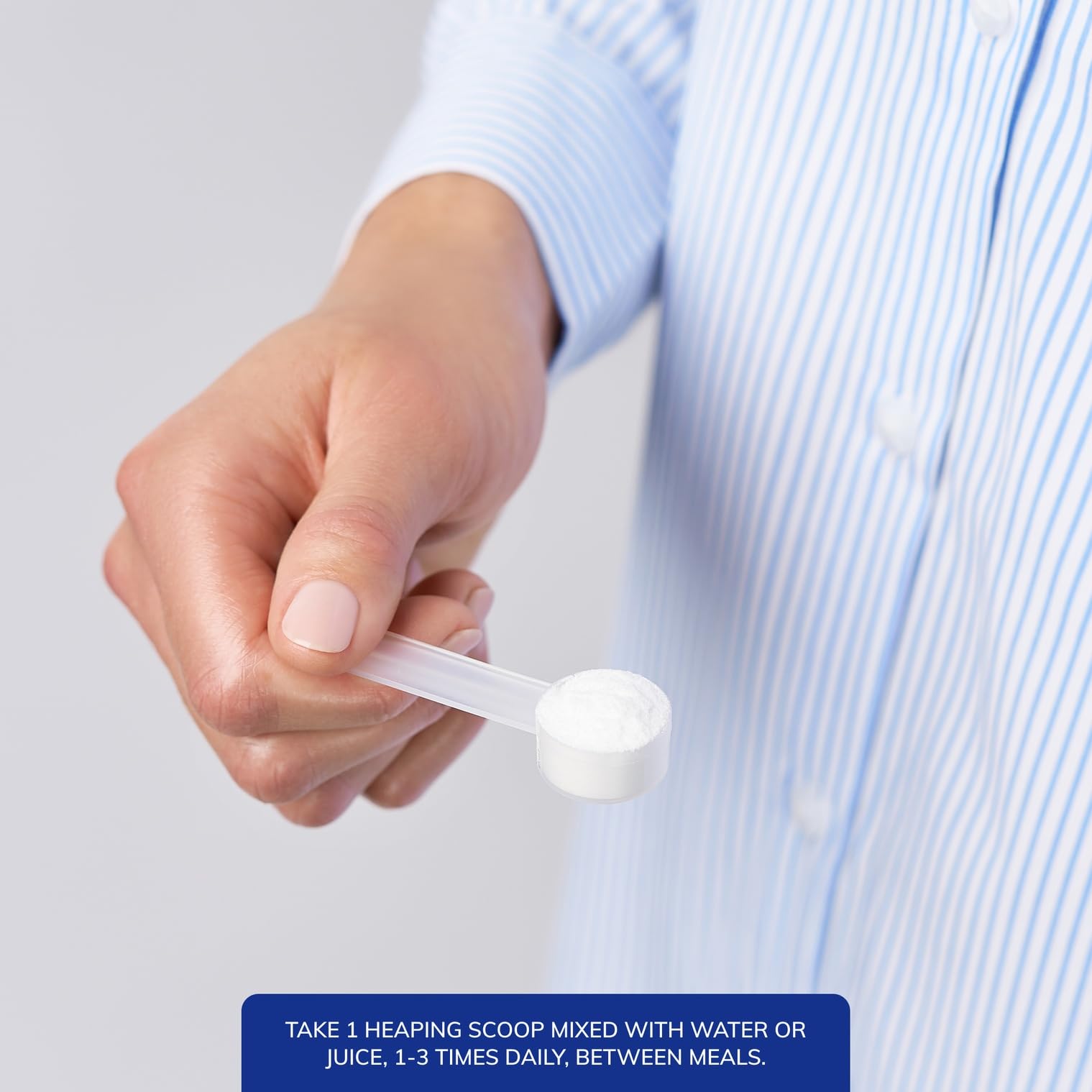 Pure Encapsulations L-Glutamine Powder dissolving in a glass of water.