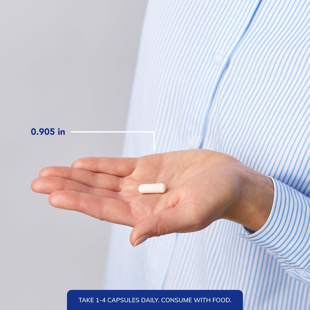 Dosage spoon with capsules ready for daily intake