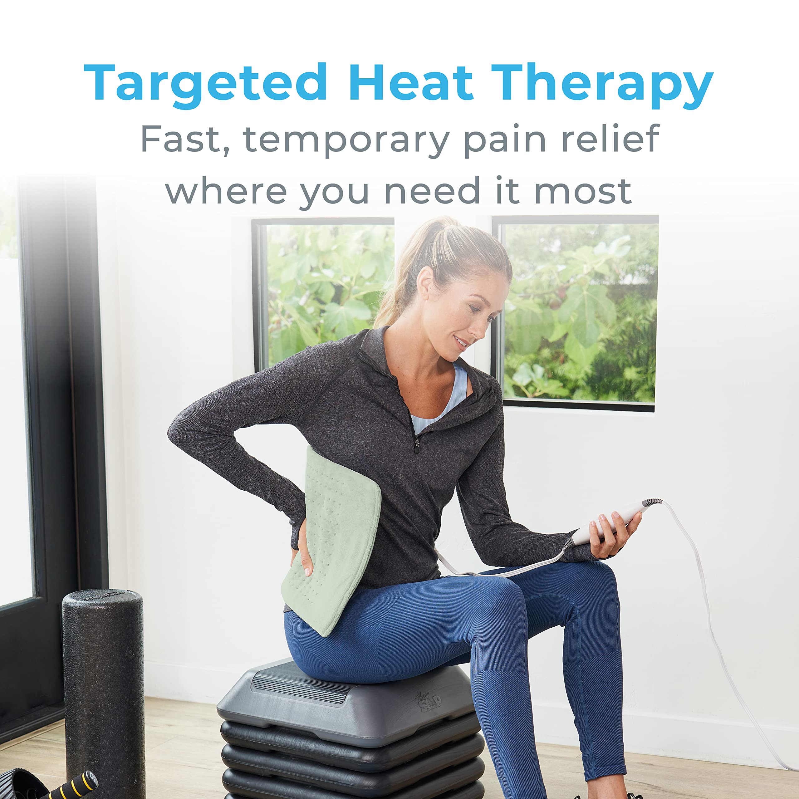Pure Enrichment PureRelief XL on bed for relaxing back and shoulders warmth