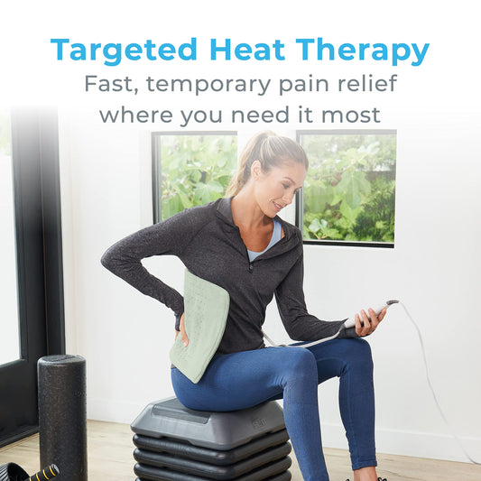 Pure Enrichment PureRelief XL on bed for relaxing back and shoulders warmth
