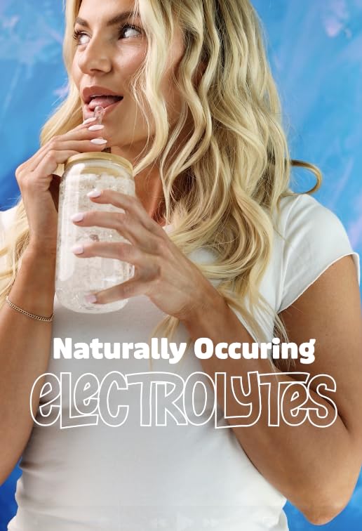 Pure Inventions Drops dispense into water showing zero calories and sugar-free profile.