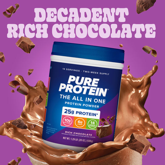 Pure Protein All-In-One scoop beside the powder for easy measuring