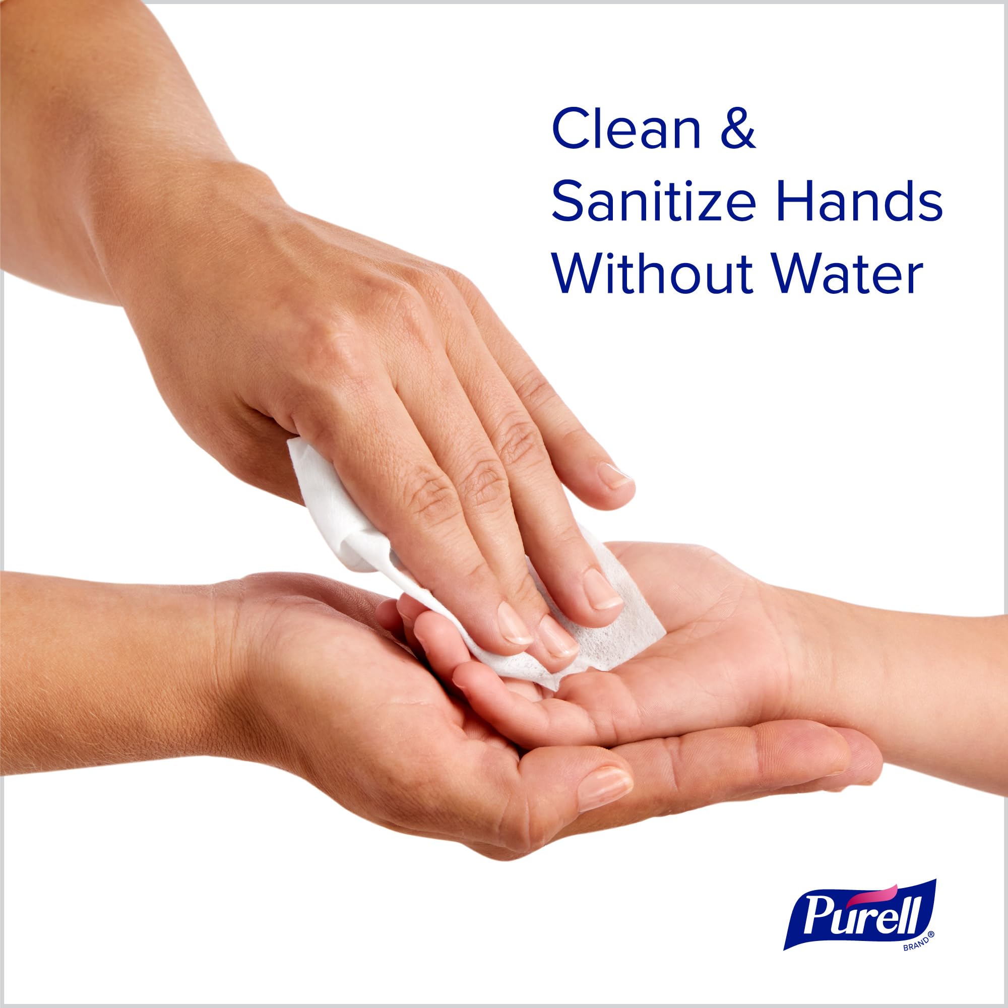 Hands using Purell wipes for quick mess cleanup and germ reduction.