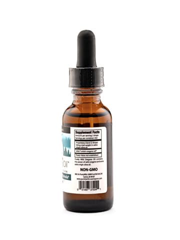 Purely Wild oregano oil bottle with fresh herbs for versatile daily use.