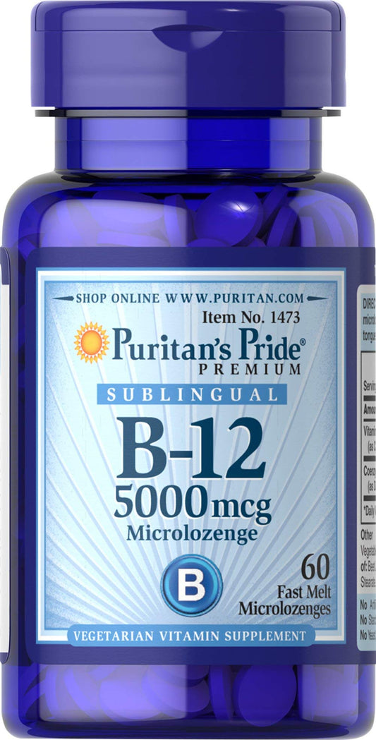 Puritan's Pride B-12 microlozenge dissolving under the tongue for quick energy support.