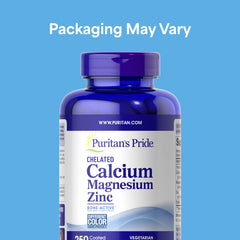 Puritan's Pride calcium-magnesium-zinc caplets closeup highlighting bone and immune support.