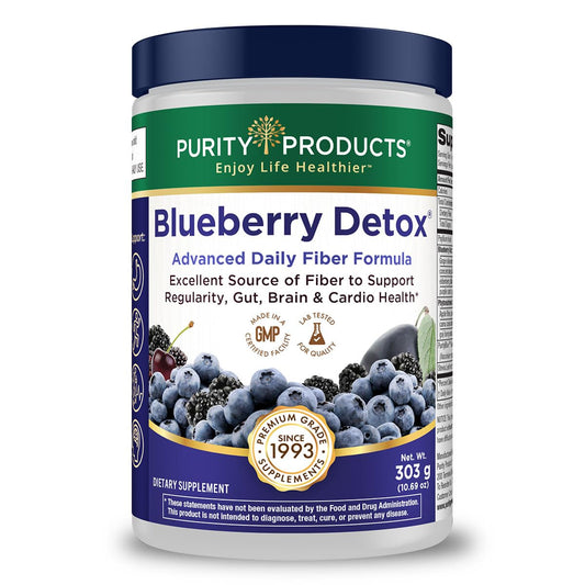 Purity Products Advanced Blueberry Detox tub on counter ready to mix.