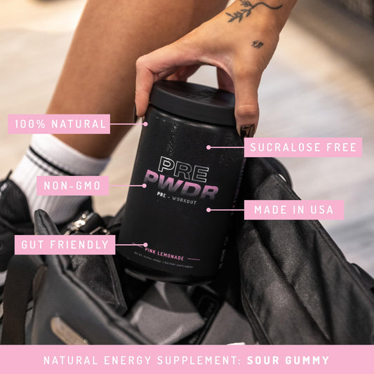Serving spoon dispensing PWDRS Pink Lemonade powder for a clean energy boost