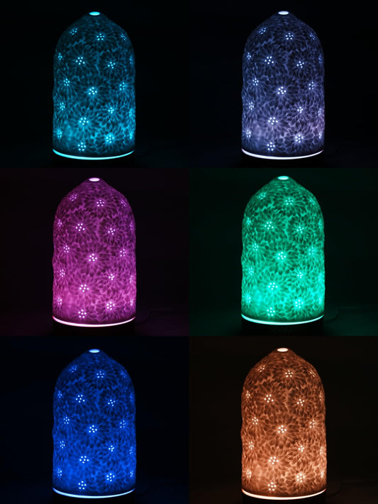 QCYBDGLOV Sunflower diffuser side view with warm glow for cozy spaces.