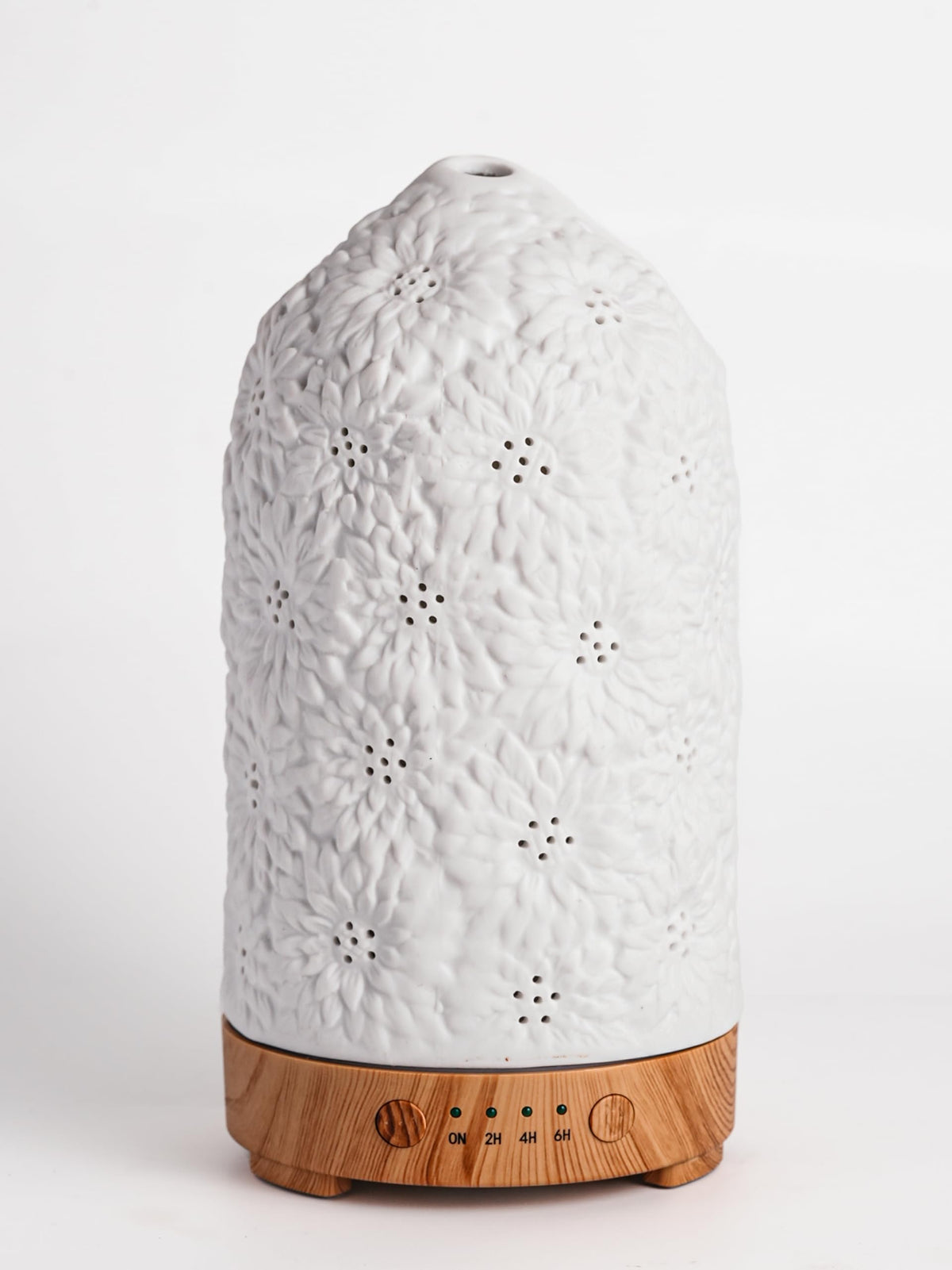 QCYBDGLOV Sunflower ceramic diffuser top view releasing soft ambient fragrance.