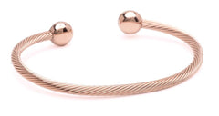 QRAY Rose Gold Deluxe packaging shown as gift-ready wellness accessory