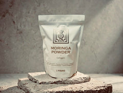 QuadraAura Moringa + Collagen Powder pour reveals earthy, unsweetened mix ready to blend