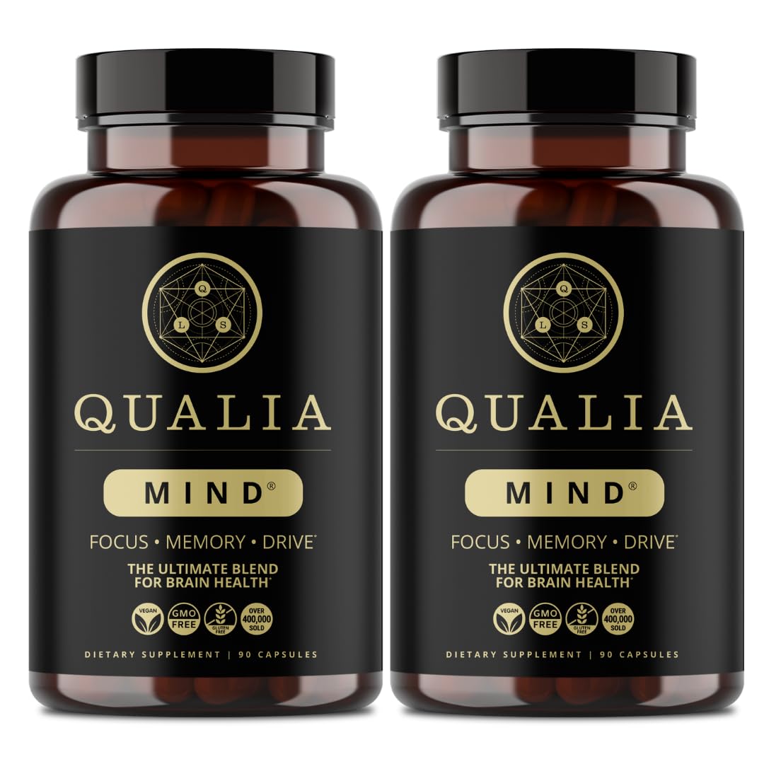 Qualia Mind bottle closeup shows premium nootropic blend for focused energy.