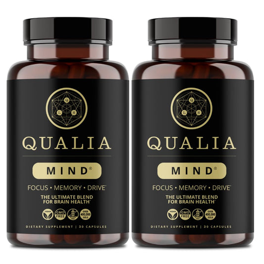 Qualia Mind bottle label closeup highlighting premium brain nutrients for focused work.