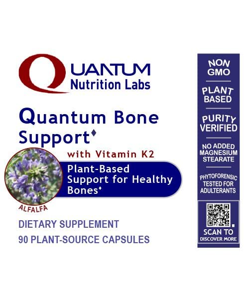 Quantum Bone Health capsules in hand; easy daily supplement routine.