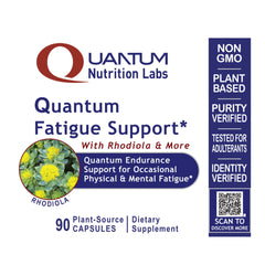 Quantum Nutrition QNL fatigue support capsules on a desk suggesting balanced energy for daily tasks.