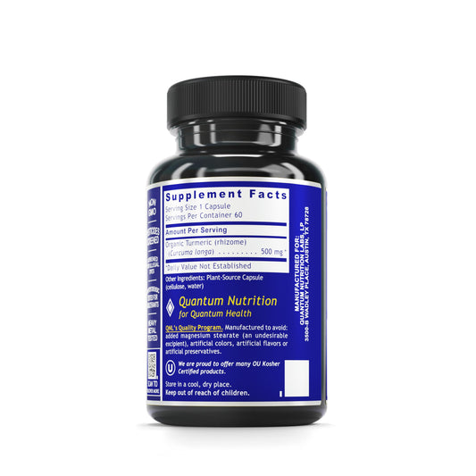 Quantum Nutrition turmeric capsules close-up with 500 mg curcumin.