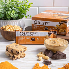 Quest Chocolate Peanut Butter Bar in a gym bag ready for post-workout fuel.