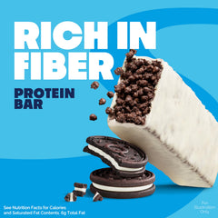 Break-apart view of Quest Cookies & Cream Crispy Bar demonstrates chewy interior.