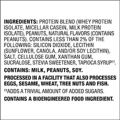 Quest Peanut Butter Protein Powder being poured into a mug
