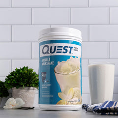 Quest Vanilla Milkshake nutrition panel highlights 1g sugar and low net carbs.