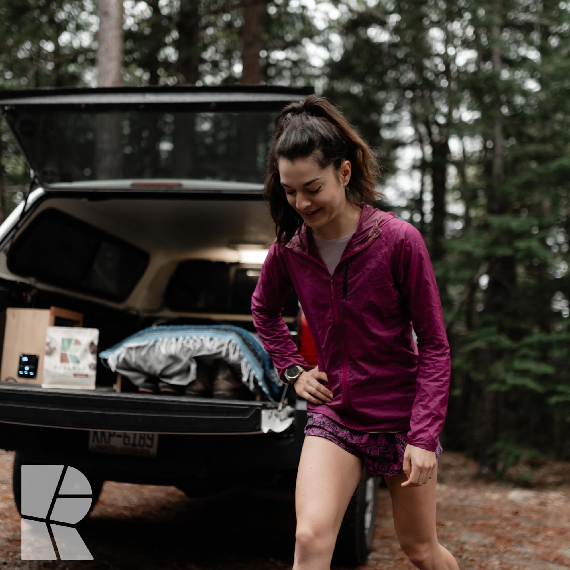 Outdoor athlete using Realand post-workout shake to refuel and support recovery.
