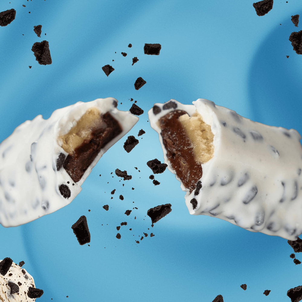 REDCON1 MRE Bar Cookies & Cream ingredients depict real-food protein sources.