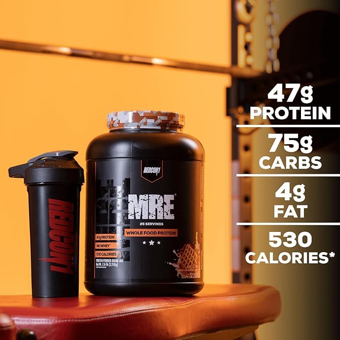 Redcon1 MRE powder being poured into a glass for a high protein shake