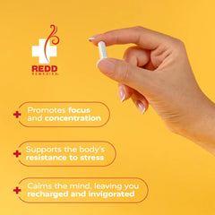 Redd Remedies at Ease bottle on desk for steady daily routine
