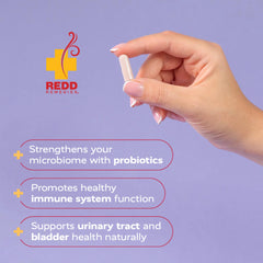 Redd Remedies UT Soothe bottle beside a glass of water for daily use.
