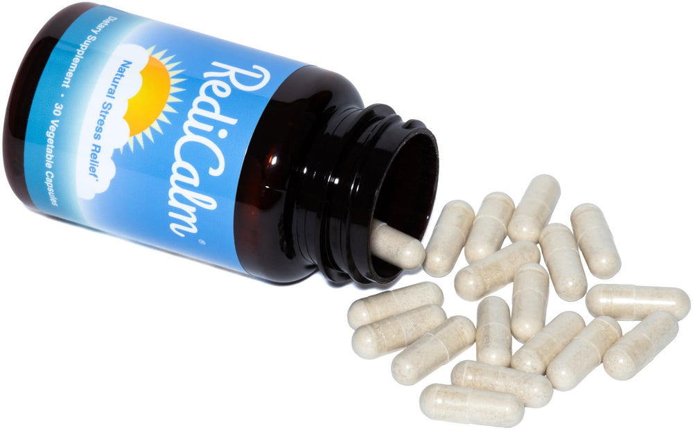 RediCalm bottle held in hand, convenient on-the-go stress relief.