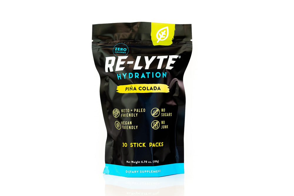 Redmond Re-Lyte Piña Colada stick-pack ready for hydration on the go