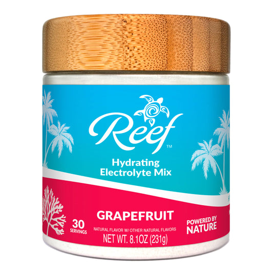 Reef Replenish grapefruit bottle front for quick hydration on the go.