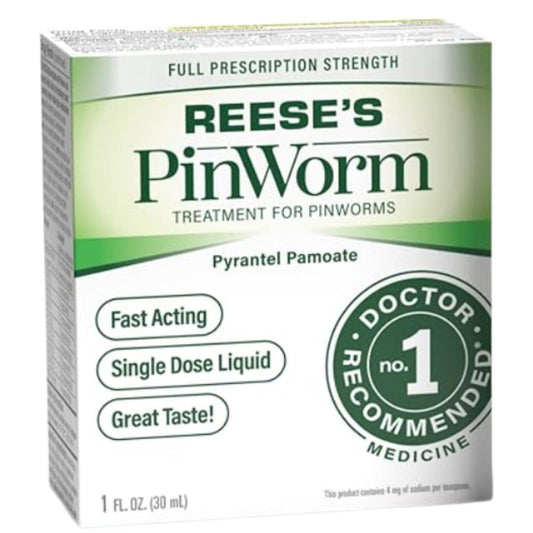 Dosing cup with REESE'S PINWORM for accurate measurement.