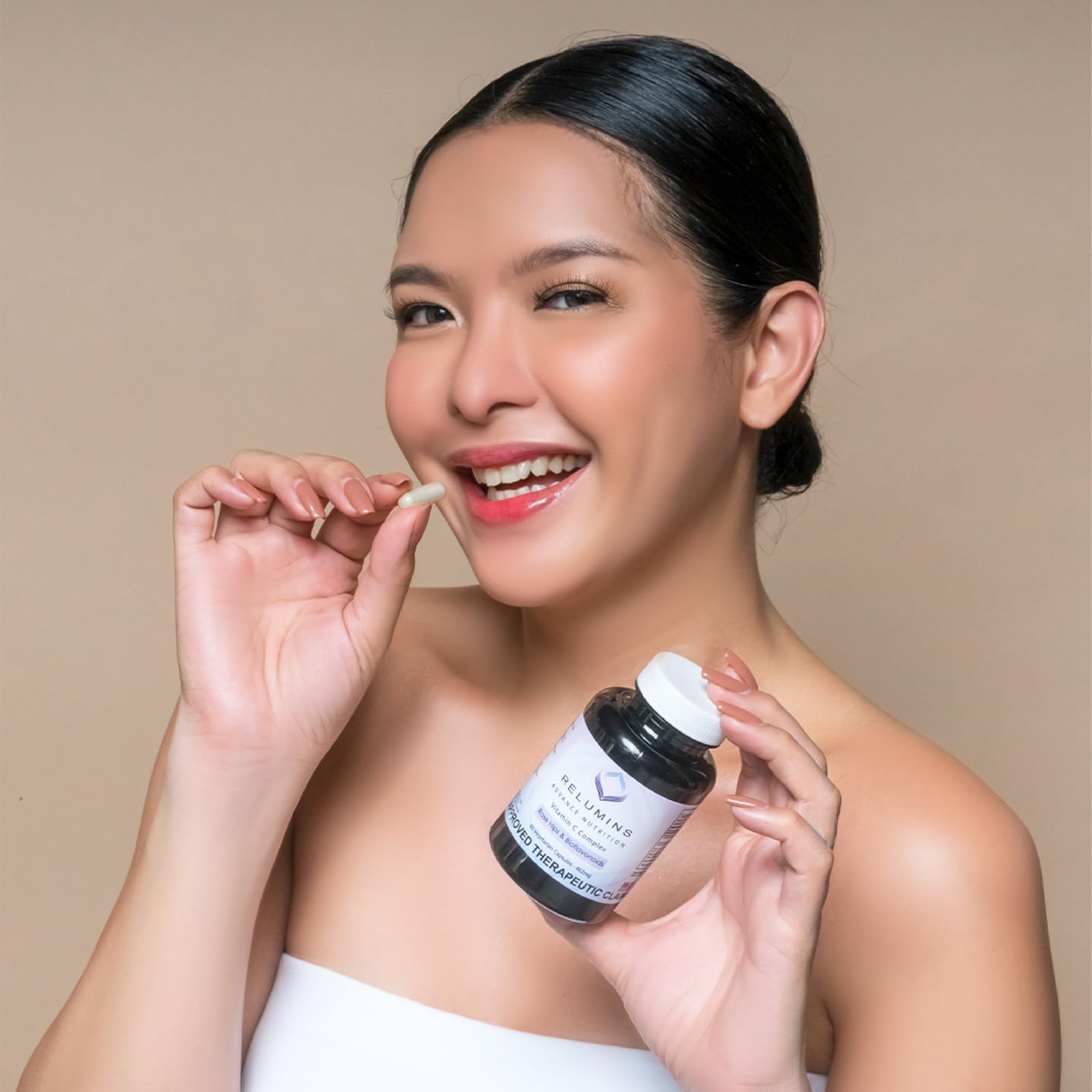 Relumins Spring Glow Essentials capsules in bottle, easy daily supplement.