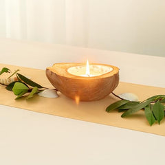 Eco-conscious design of Coco Casa coconut shell candle