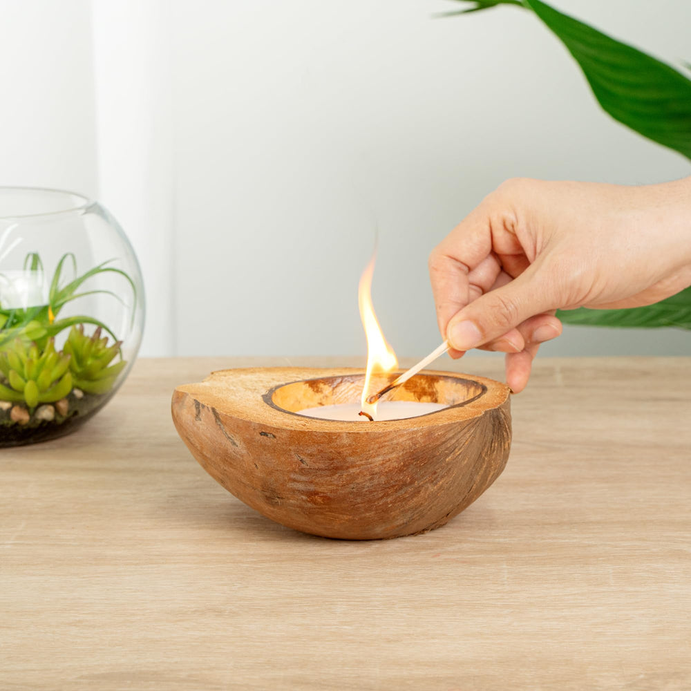 Coco Casa candle on dining table complements rustic decor