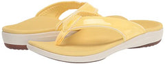 REVITALIGN Yumi yellow patent-like finish complements casual outfits.
