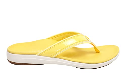 REVITALIGN Yumi yellow worn-in sandal demonstrates versatile everyday use.