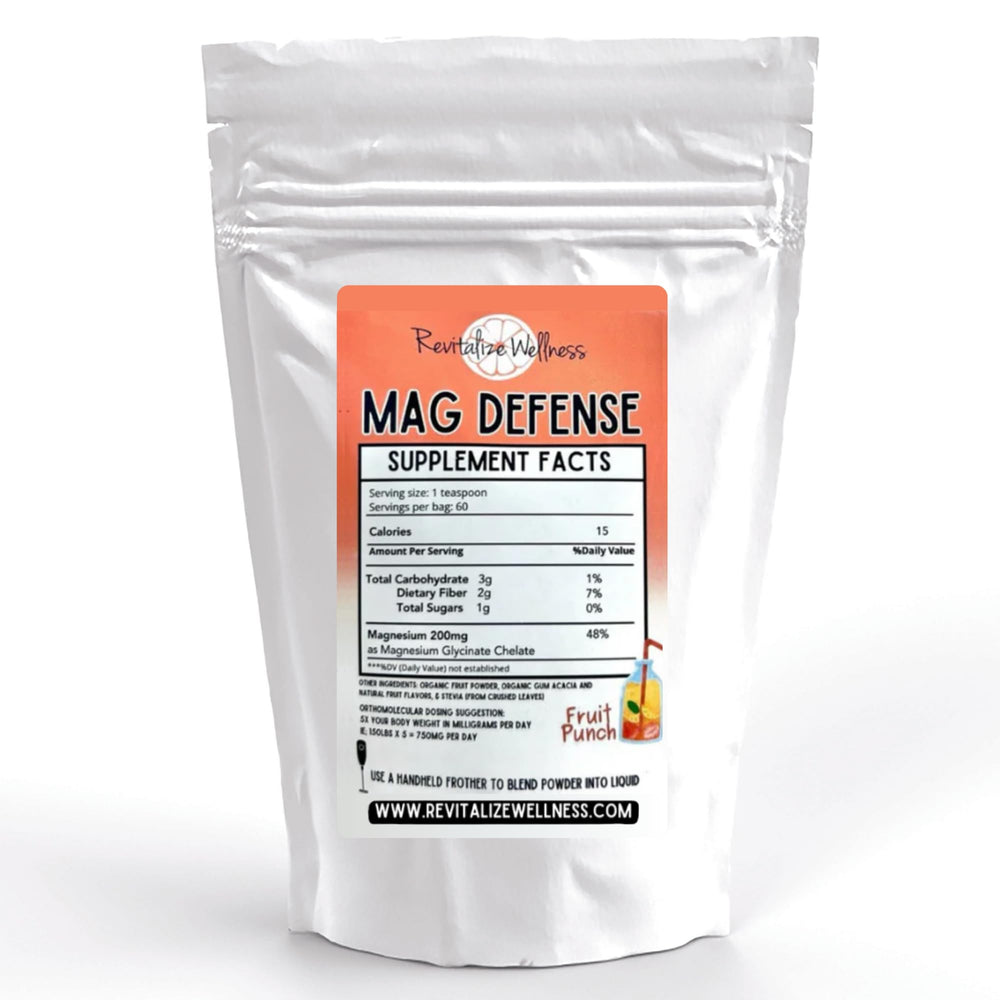 Revitalize Wellness Mag Defense powder with a teaspoon scoop for easy daily magnesium support